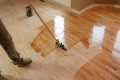 Hardwood floor refinishing by trial
