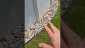 $3,000 to remove old and install new weed fabric, plastic edging, and cobble stone around pool