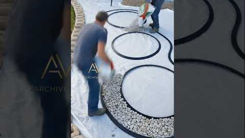 Absolutely stunning curved garden transformation with white stones & red mulch 🤯✨ #DIY #landscaping