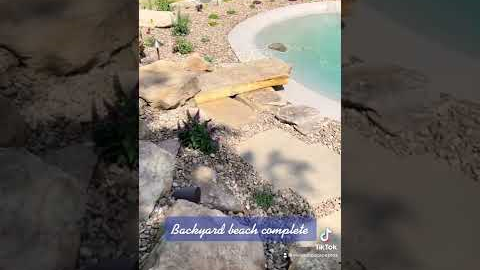Backyard beach pool is complete! #biodesignpools #VIVID #landscape #indiana
