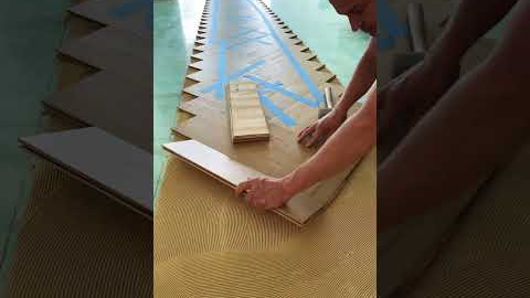 Herringbone wood flooring installation